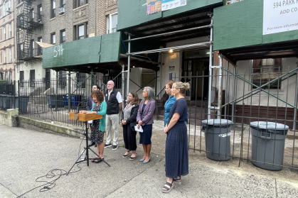 Deputy Mayor for Operations Meera Joshi announces the GreenHOUSE fund to a small crowd of reporters and advocates on Thursday, Sept. 26th.